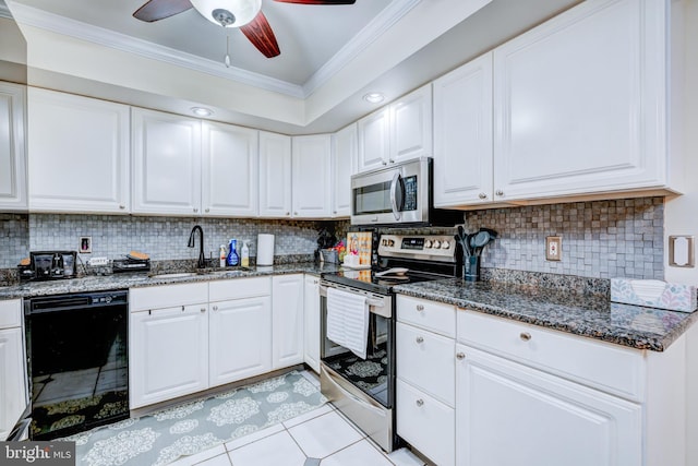 54 Camellia Rd, Levittown, PA 19057 - kitchen featuring a sink, stainless steel appliances, ornamental molding, white cabinets, and decorative backsplash