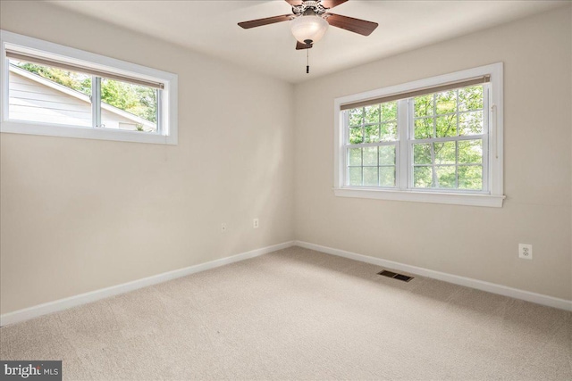 3427 Ramsgate Ter, Alexandria, VA 22309 - carpeted empty room featuring plenty of natural light, baseboards, and a ceiling fan
