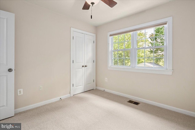 3427 Ramsgate Ter, Alexandria, VA 22309 - unfurnished bedroom with carpet flooring, baseboards, a closet, and a ceiling fan