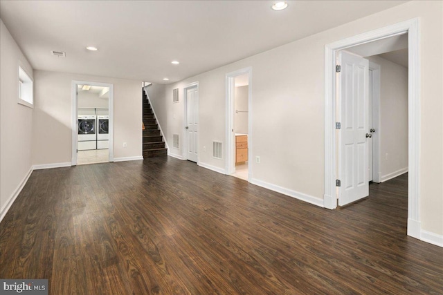 3427 Ramsgate Ter, Alexandria, VA 22309 - unfurnished living room with stairway, recessed lighting, dark wood-style floors, baseboards, and washing machine and clothes dryer