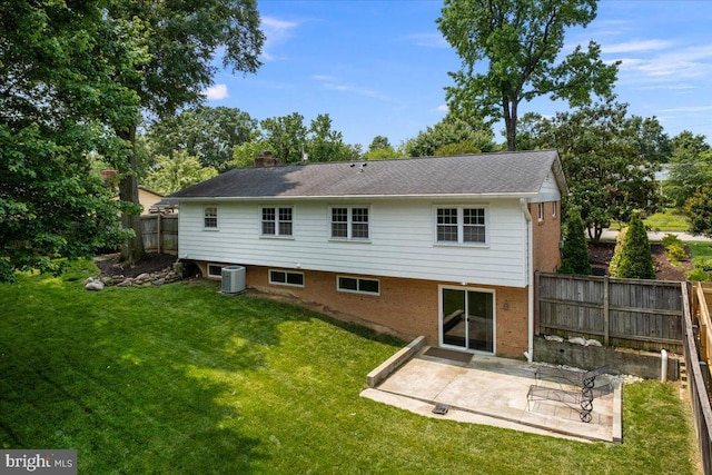 3427 Ramsgate Ter, Alexandria, VA 22309 - back of property with cooling unit, a patio, brick siding, and a chimney