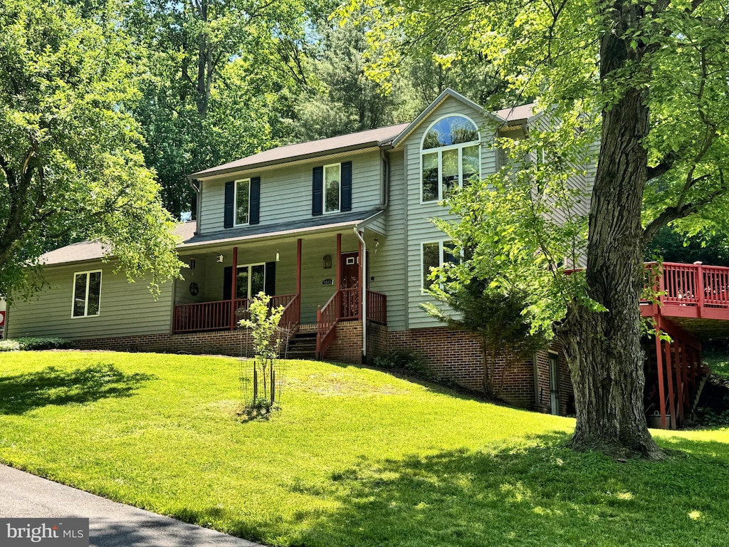5943 Gales Ln, Columbia, MD 21045 - view of front of home with a porch and a front yard