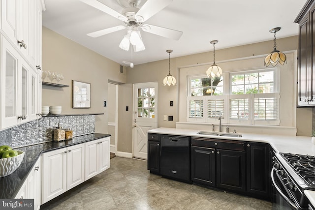 858 S Front St, Philadelphia, PA 19147 - kitchen with a sink, black dishwasher, white cabinetry, and ceiling fan