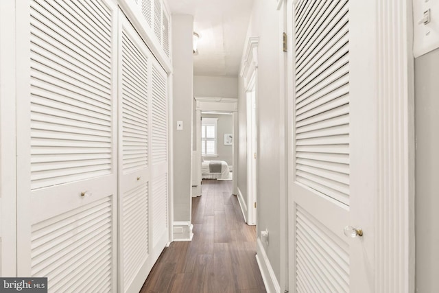 858 S Front St, Philadelphia, PA 19147 - corridor with dark wood-style floors and baseboards
