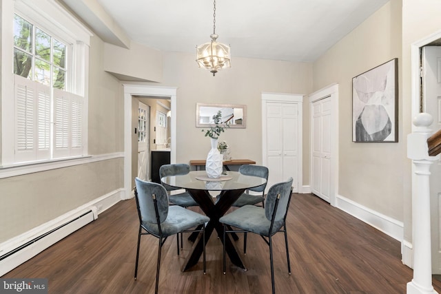 858 S Front St, Philadelphia, PA 19147 - dining area with a baseboard radiator, dark wood finished floors, a chandelier, and baseboards