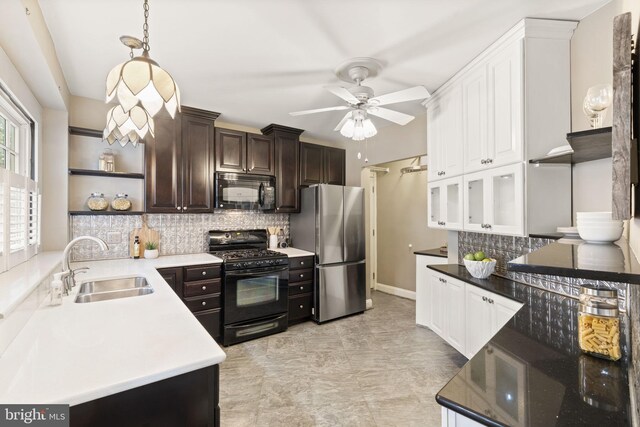 858 S Front St, Philadelphia, PA 19147 - kitchen featuring black appliances, a sink, a ceiling fan, dark brown cabinetry, and open shelves