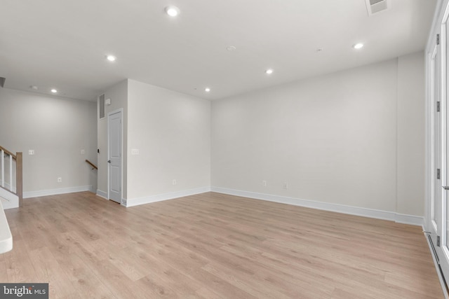 43288 Farringdon Sq, Broadlands, VA 20148 - spare room featuring light wood-style floors, recessed lighting, baseboards, and stairway