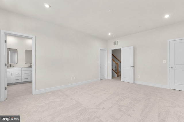 43288 Farringdon Sq, Broadlands, VA 20148 - unfurnished bedroom featuring light carpet, a sink, recessed lighting, baseboards, and ensuite bathroom