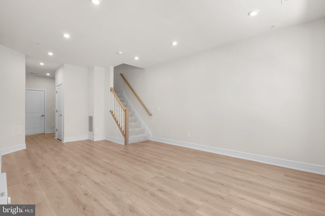 43288 Farringdon Sq, Broadlands, VA 20148 - empty room with light wood-type flooring, recessed lighting, stairway, and baseboards
