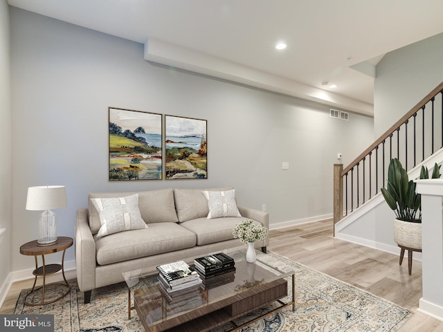 719 Cantrell St, Philadelphia, PA 19148 - living area with light wood-type flooring, stairs, recessed lighting, and baseboards