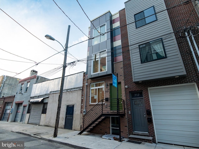 719 Cantrell St, Philadelphia, PA 19148 - view of property with a garage