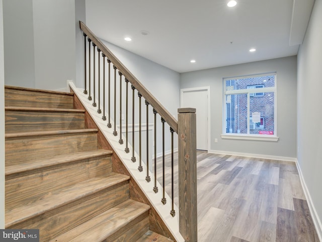 719 Cantrell St, Philadelphia, PA 19148 - staircase featuring wood finished floors, recessed lighting, and baseboards