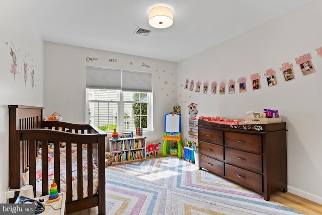1827 Wexford Rd, Palmyra, PA 17078 - bedroom with a crib and wood finished floors