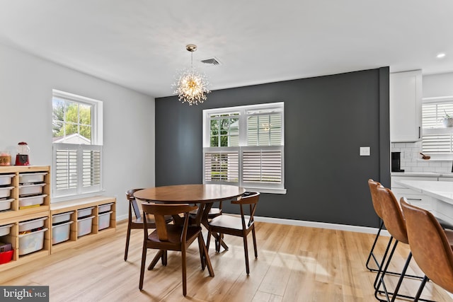 1827 Wexford Rd, Palmyra, PA 17078 - dining room featuring a chandelier, light wood-style flooring, recessed lighting, a fireplace, and baseboards
