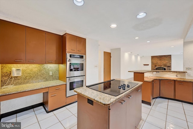 22 Woodholme Village Ct, Baltimore, MD 21208 - kitchen featuring double oven, black electric stovetop, backsplash, a kitchen island, and recessed lighting