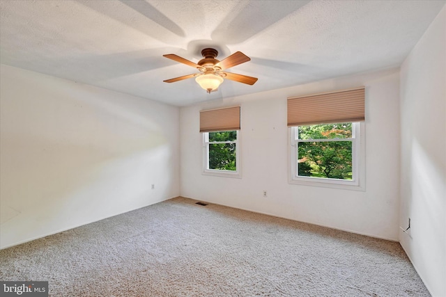22 Woodholme Village Ct, Baltimore, MD 21208 - carpeted empty room with a ceiling fan
