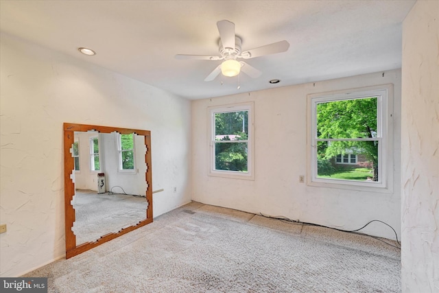 22 Woodholme Village Ct, Baltimore, MD 21208 - spare room featuring healthy amount of natural light, carpet floors, and a ceiling fan