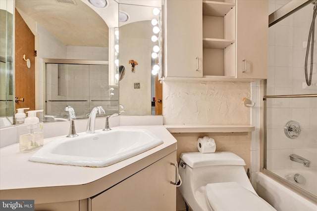 22 Woodholme Village Ct, Baltimore, MD 21208 - full bathroom with toilet, vanity, and bath / shower combo with glass door
