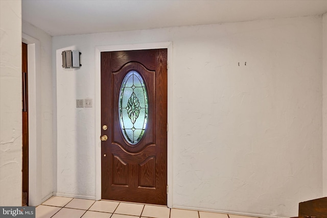 22 Woodholme Village Ct, Baltimore, MD 21208 - entryway featuring light tile patterned floors and baseboards