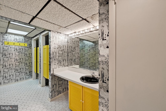 22 Woodholme Village Ct, Baltimore, MD 21208 - full bath featuring vanity, a drop ceiling, and tile patterned floors