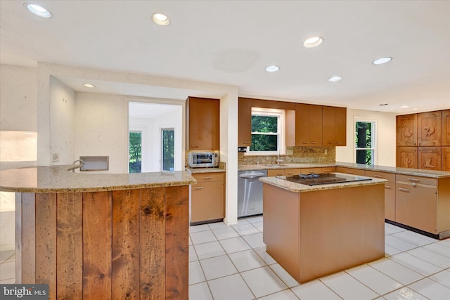 22 Woodholme Village Ct, Baltimore, MD 21208 - kitchen featuring stainless steel dishwasher, a peninsula, black electric cooktop, recessed lighting, and a center island