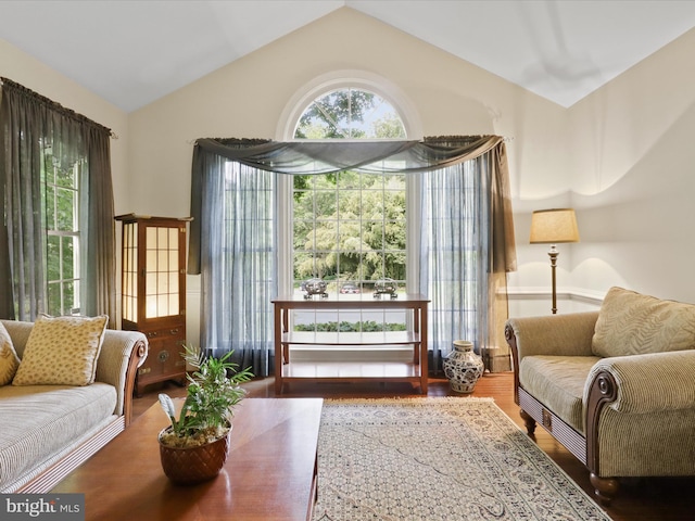 6805 Spout Ln, Fairfax Station, VA 22039 - sitting room featuring wood finished floors and vaulted ceiling