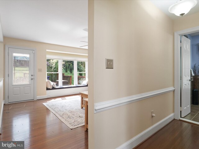 6805 Spout Ln, Fairfax Station, VA 22039 - foyer featuring wood-type flooring, baseboards, and a ceiling fan