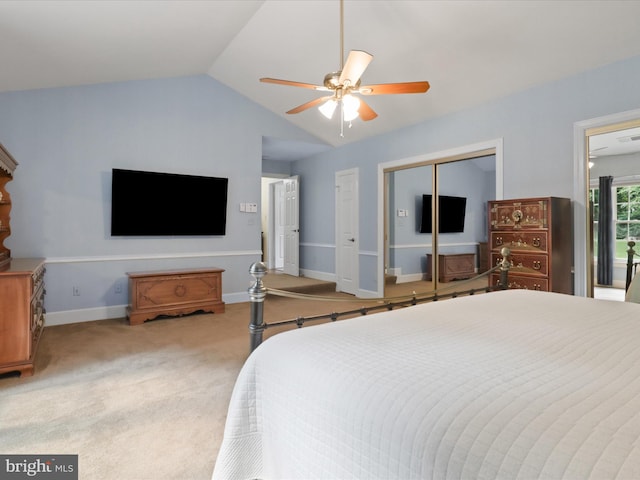 6805 Spout Ln, Fairfax Station, VA 22039 - carpeted bedroom featuring lofted ceiling, a closet, baseboards, and a ceiling fan