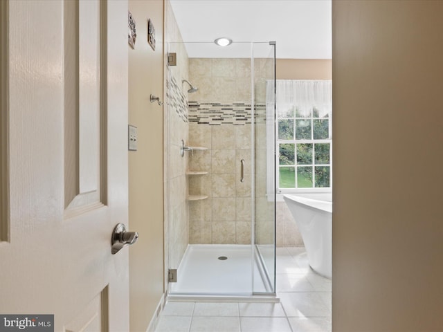 6805 Spout Ln, Fairfax Station, VA 22039 - full bathroom featuring a freestanding tub, a stall shower, and tile patterned floors