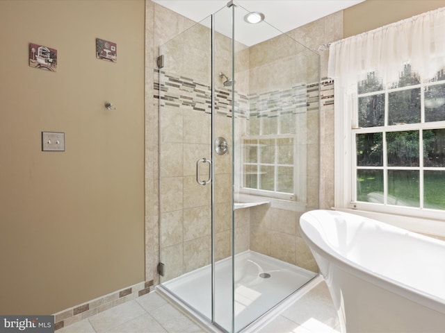 6805 Spout Ln, Fairfax Station, VA 22039 - full bathroom with a freestanding bath, a shower stall, and tile patterned flooring