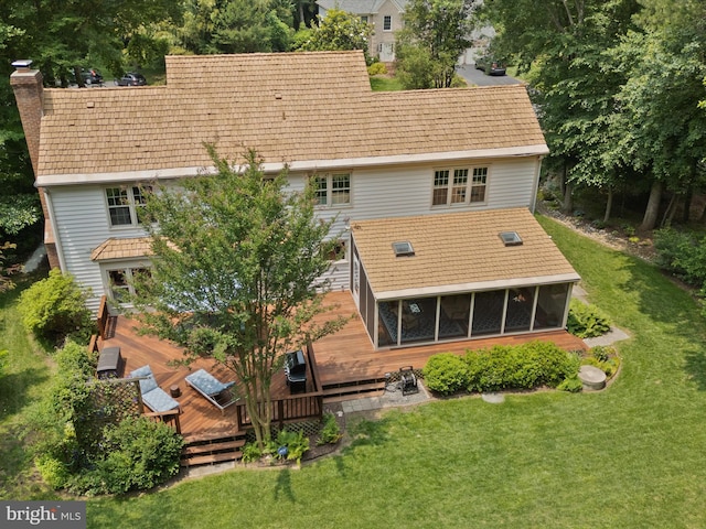 6805 Spout Ln, Fairfax Station, VA 22039 - back of property with a wooden deck, a sunroom, a chimney, and a yard