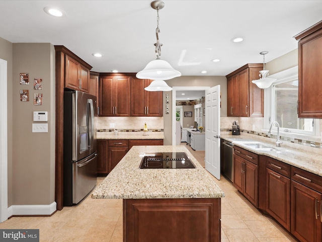 6805 Spout Ln, Fairfax Station, VA 22039 - kitchen featuring stainless steel appliances, a sink, a kitchen island, decorative backsplash, and light tile patterned flooring