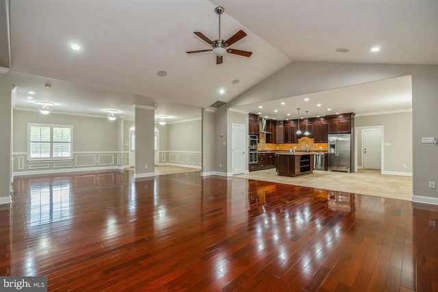 265 N Cologne Ave, Egg Harbor City, NJ 08215 - unfurnished living room featuring ceiling fan, light wood-type flooring, ornamental molding, decorative columns, and high vaulted ceiling
