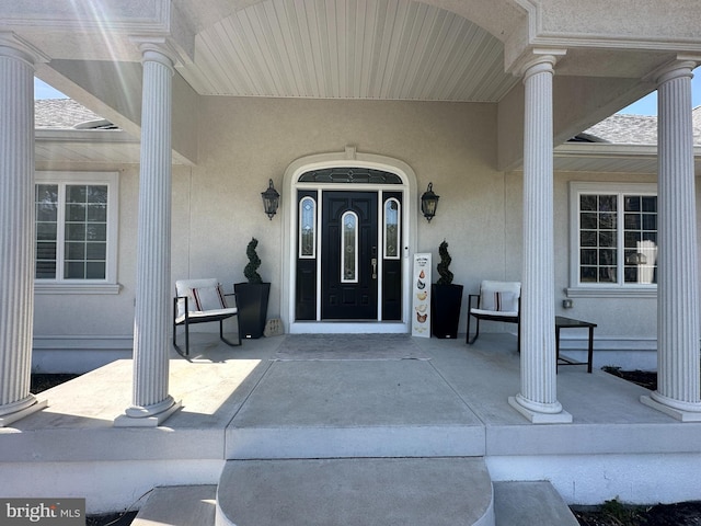 265 N Cologne Ave, Egg Harbor City, NJ 08215 - entrance to property with a porch and stucco siding