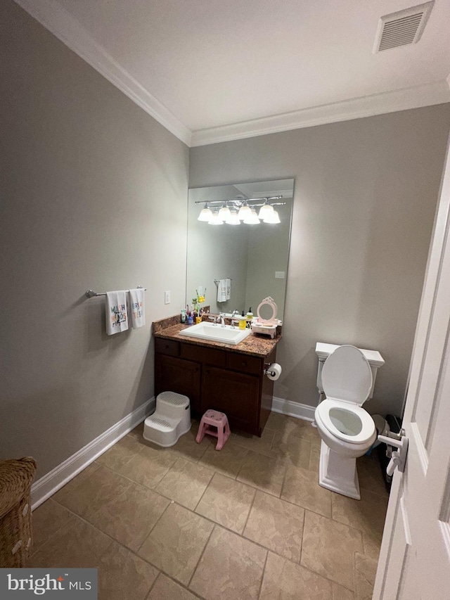 265 N Cologne Ave, Egg Harbor City, NJ 08215 - bathroom with ornamental molding, vanity, toilet, and baseboards