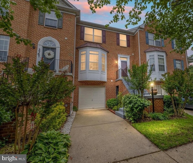 3765 Glebe Meadow Way, Edgewater, MD 21037 - view of property with driveway, an attached garage, and brick siding