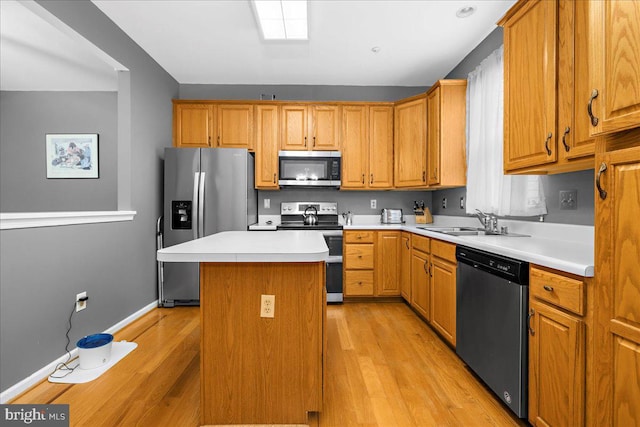 3765 Glebe Meadow Way, Edgewater, MD 21037 - kitchen with appliances with stainless steel finishes, light wood finished floors, a center island, and light countertops