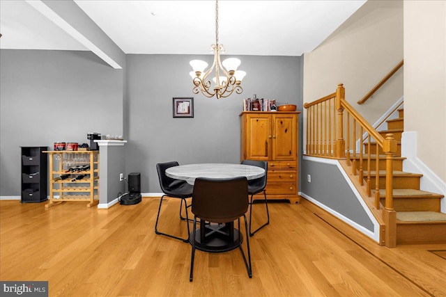 3765 Glebe Meadow Way, Edgewater, MD 21037 - dining room with light wood-style flooring, baseboards, and stairway