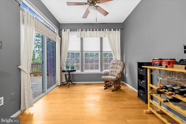 3765 Glebe Meadow Way, Edgewater, MD 21037 - living area featuring wood finished floors, baseboards, and ceiling fan