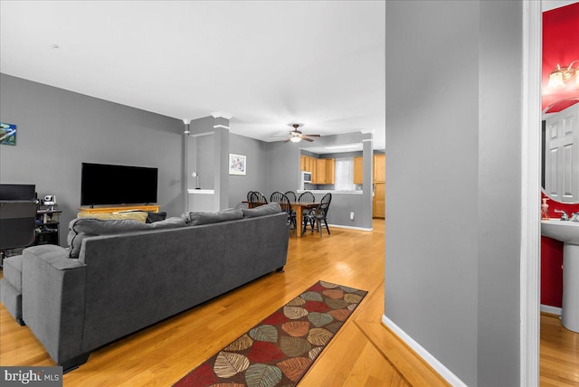 3765 Glebe Meadow Way, Edgewater, MD 21037 - living room featuring ceiling fan and light wood-style floors