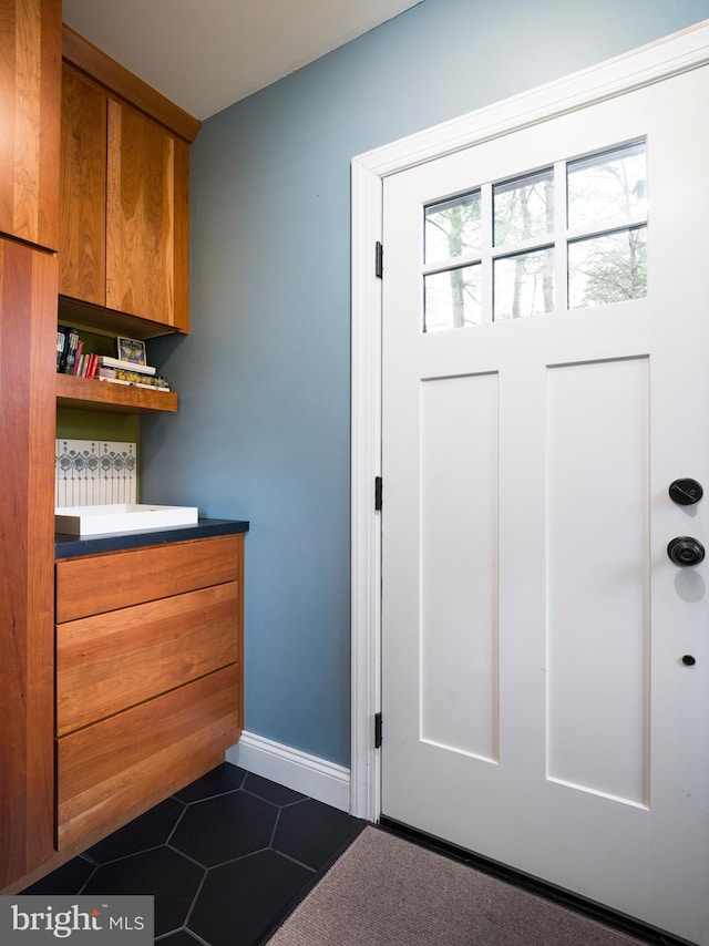 442 Old Eagle School Rd, Wayne, PA 19087 - interior space featuring dark tile patterned flooring and baseboards