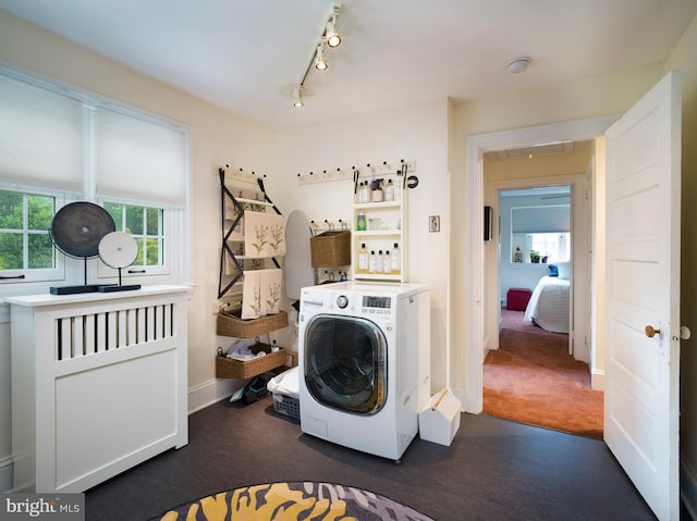 442 Old Eagle School Rd, Wayne, PA 19087 - washroom with washer / dryer, baseboards, dark carpet, attic access, and track lighting