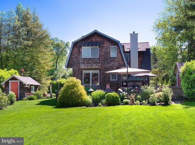 442 Old Eagle School Rd, Wayne, PA 19087 - rear view of house with a gambrel roof, a chimney, an outbuilding, and a gazebo