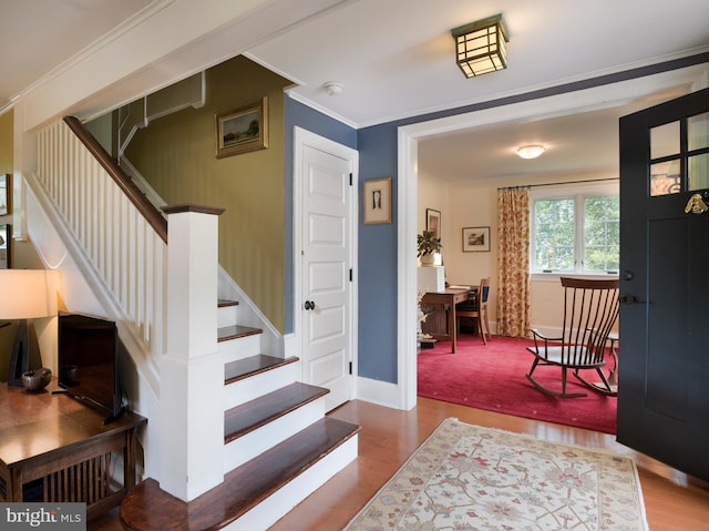 442 Old Eagle School Rd, Wayne, PA 19087 - stairs with wood finished floors, crown molding, and baseboards