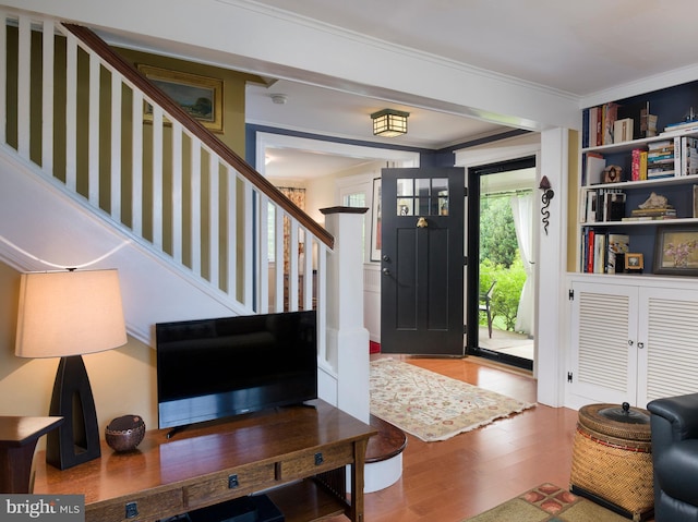 442 Old Eagle School Rd, Wayne, PA 19087 - foyer entrance with wood finished floors, crown molding, and stairway