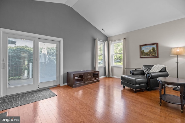22 Goldfields Ave, Langhorne, PA 19047 - living area with wood finished floors, high vaulted ceiling, and baseboards