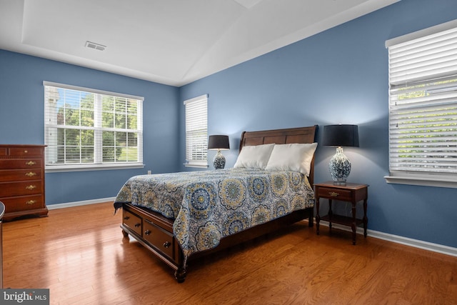 22 Goldfields Ave, Langhorne, PA 19047 - bedroom featuring wood finished floors, baseboards, and lofted ceiling