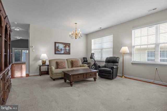 22 Goldfields Ave, Langhorne, PA 19047 - living room with a chandelier, carpet flooring, and baseboards