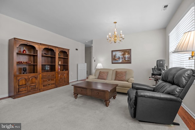 22 Goldfields Ave, Langhorne, PA 19047 - living room featuring a chandelier and baseboards