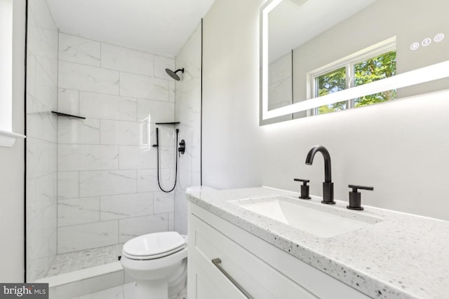 3713 Deming Dr, Suitland, MD 20746 - bathroom featuring toilet, vanity, and a tile shower